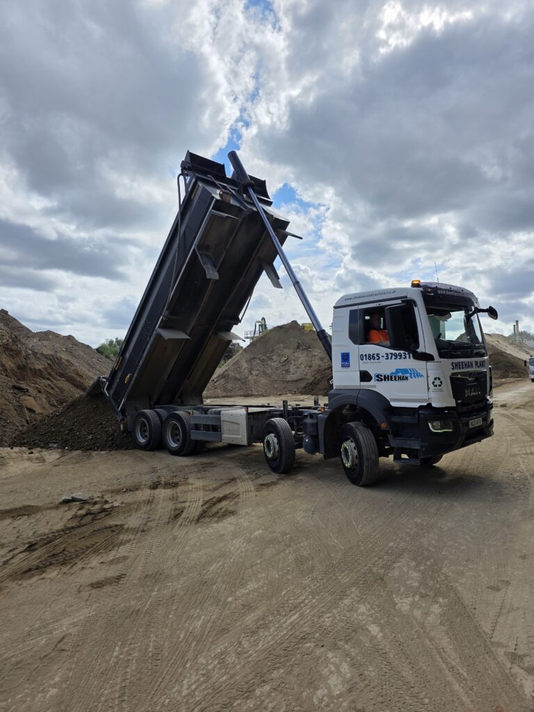 8 Wheel Tipper offloading muck 3