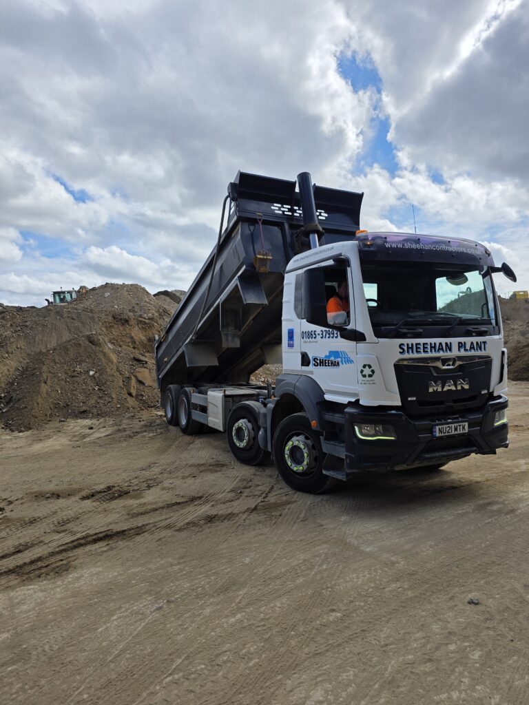 8 wheel tipper offloading muck 1