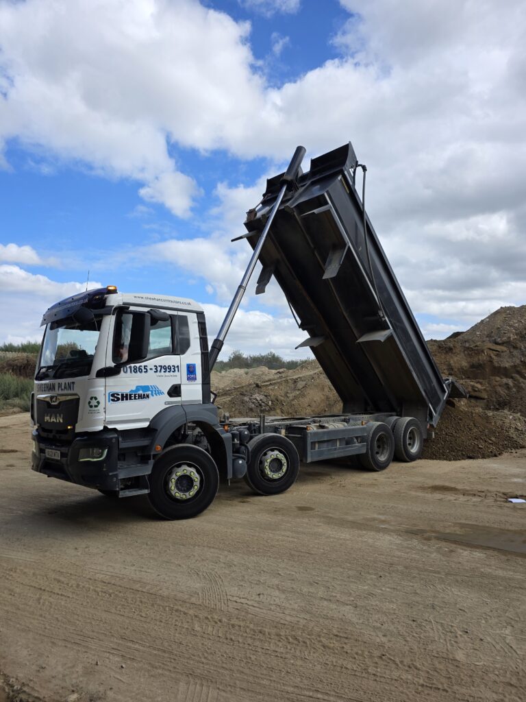 8 wheel tipper offloading muck 2